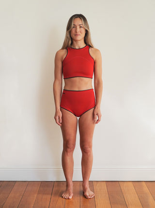 Our high waisted 2mm red wetsuit shorts for women
