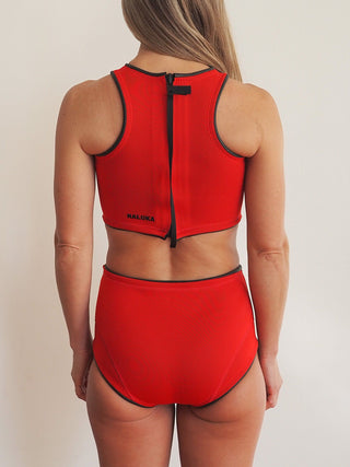 red wetsuit vest for women, sleeveless design. Focus on the back zip of our vest